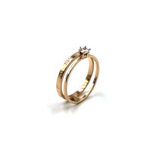 Διπλό δαχτυλίδι ατσάλι σε ροζ χρυσό βέρα και μονόπετρο